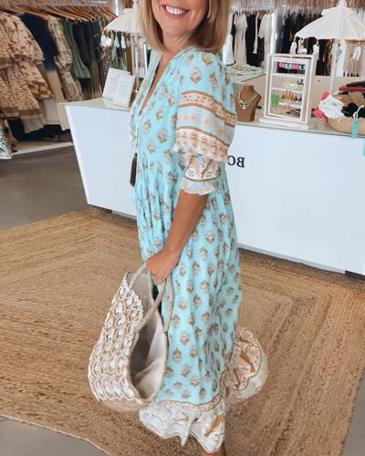 Mana - Vibrant Floral V-Neck Dress