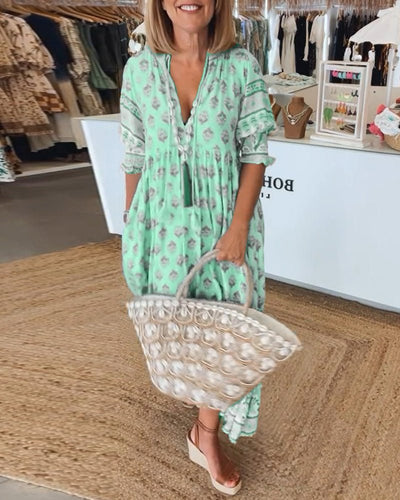 Mana - Vibrant Floral V-Neck Dress