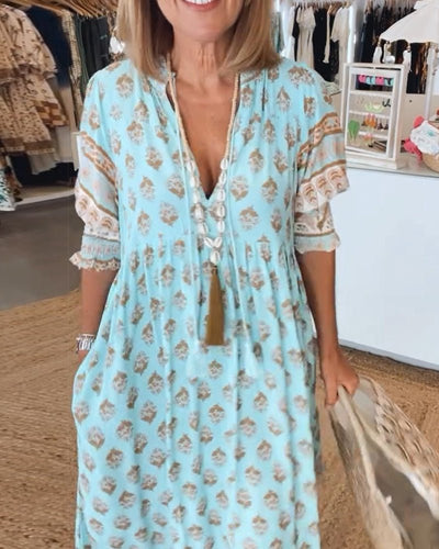 Mana - Vibrant Floral V-Neck Dress